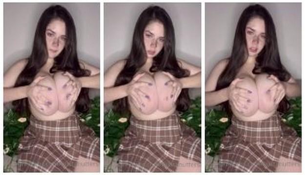 Busty Sara Bustani playing with her Tits